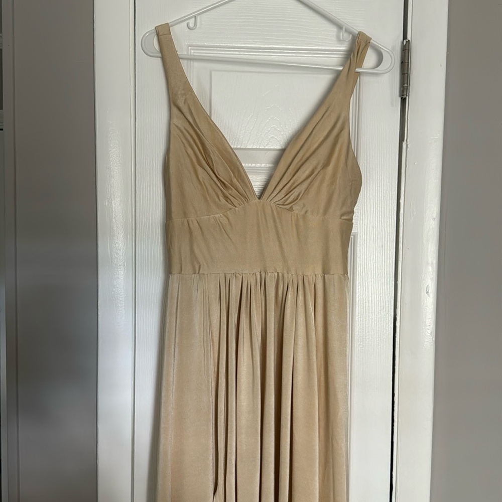 Never worn new bridesmaids dress. Light champagne
